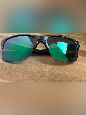 Oakley Men's Black Frame Sunglasses with Green Mirrored Lenses